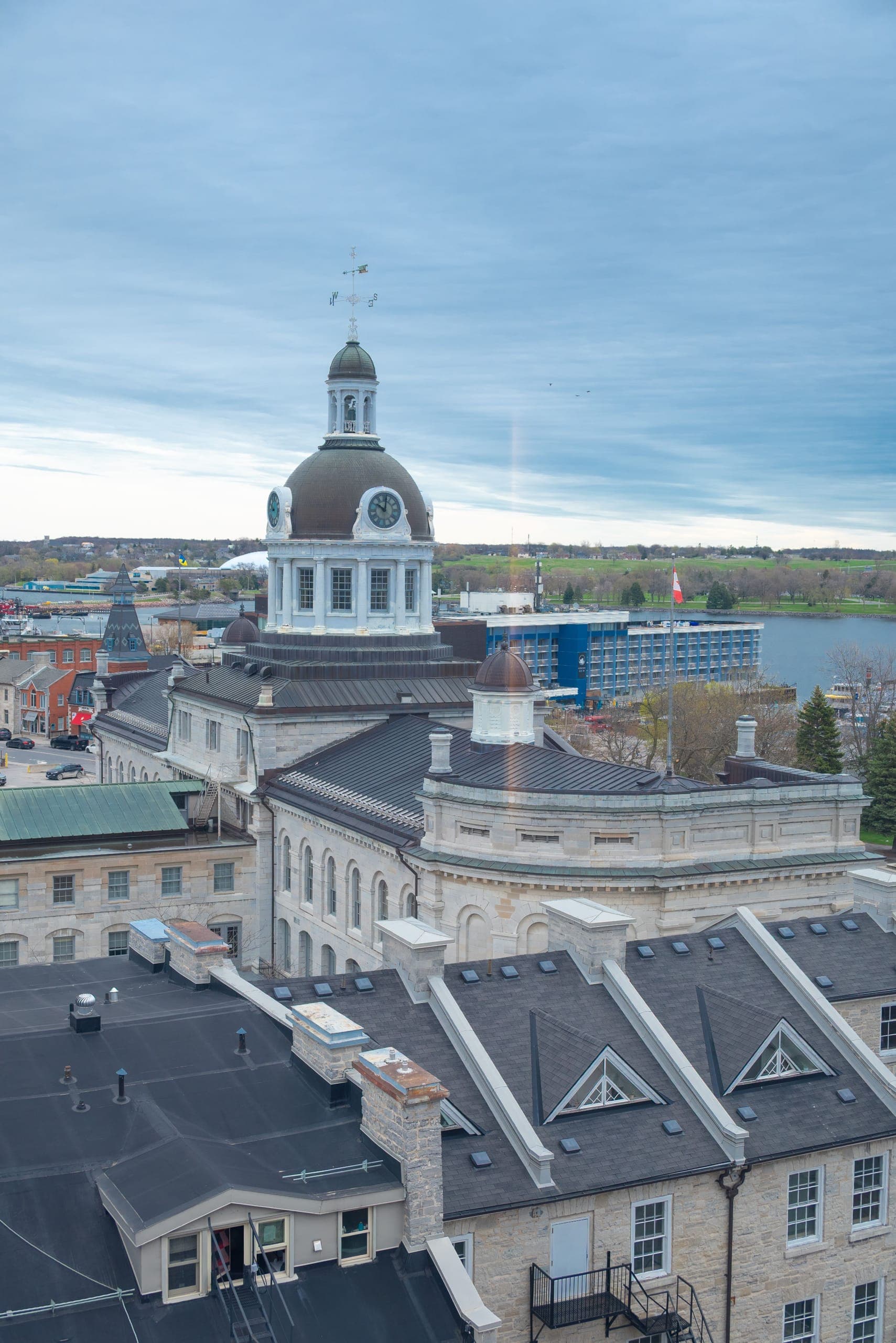Kingston City Hall and its dome from above, Lake Ontario behind